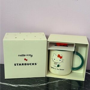 Starbucks Hello Kitty Mug with Red Bow and Green Handle
